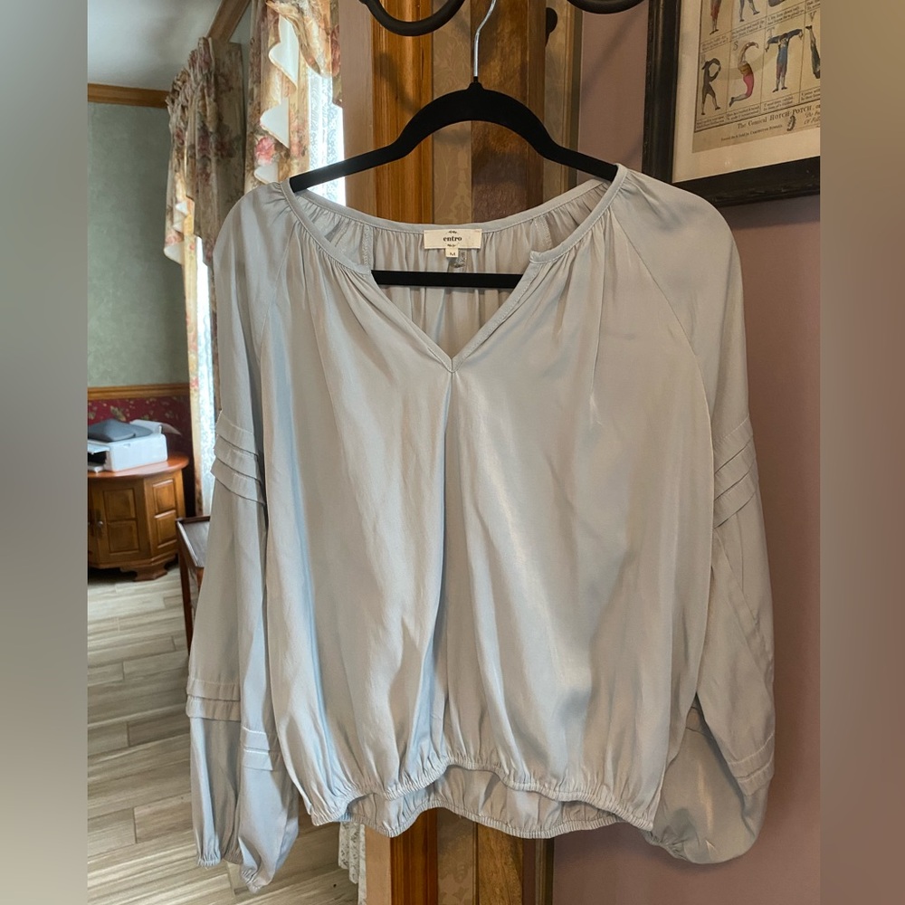 Beautiful etro, size medium, pale blue, decorative sleeve, elastic bottom blouse